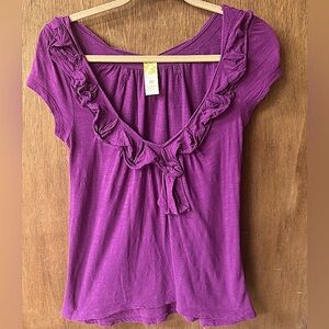 Anthropologie cotton tee with rosette neckline